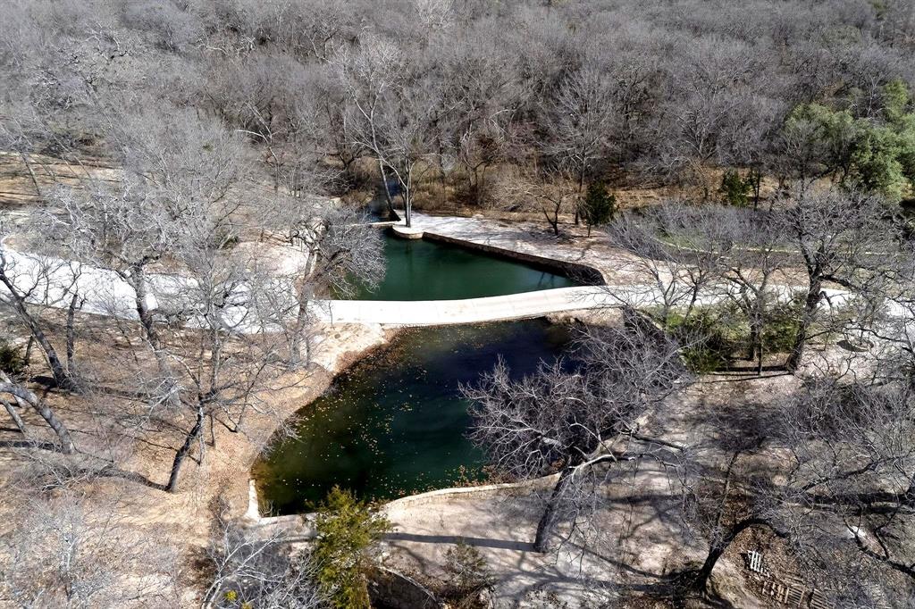 3095 Carter Road Springtown, TX 76082 - Photo 22 of 27 a view of a back yard of the house