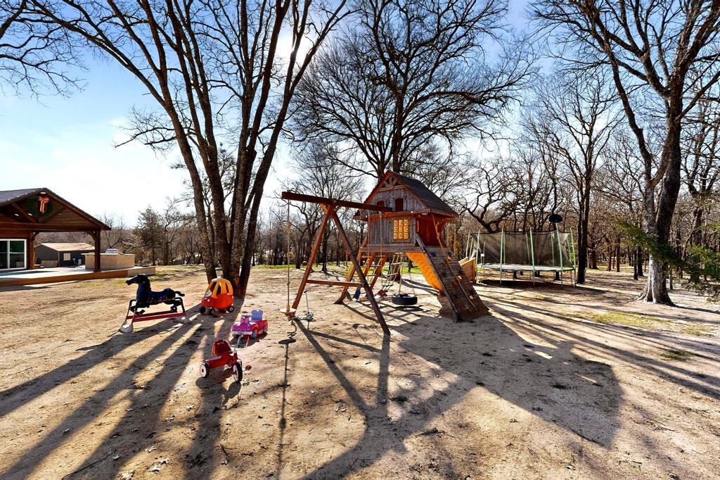 3095 Carter Road Springtown, TX 76082 - Photo 23 of 27 a view of a park with iron fence