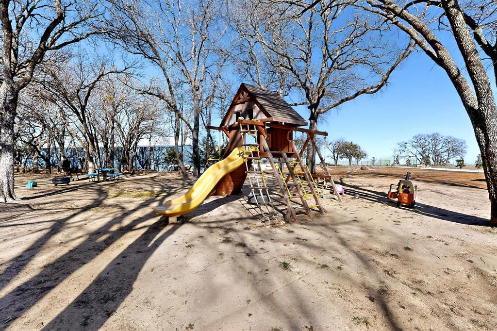 3095 Carter Road Springtown, TX 76082 - Photo 25 of 27 a view of a yard with wooden fence