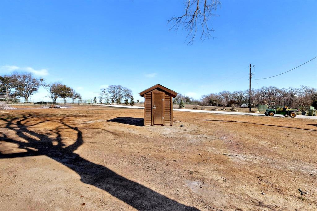 3095 Carter Road Springtown, TX 76082 - Photo 27 of 27 a view of a road with a yard