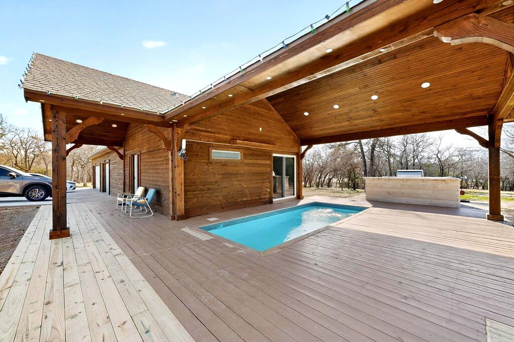 3095 Carter Road Springtown, TX 76082 - Photo 4 of 27 a swimming pool with view of outdoor seating