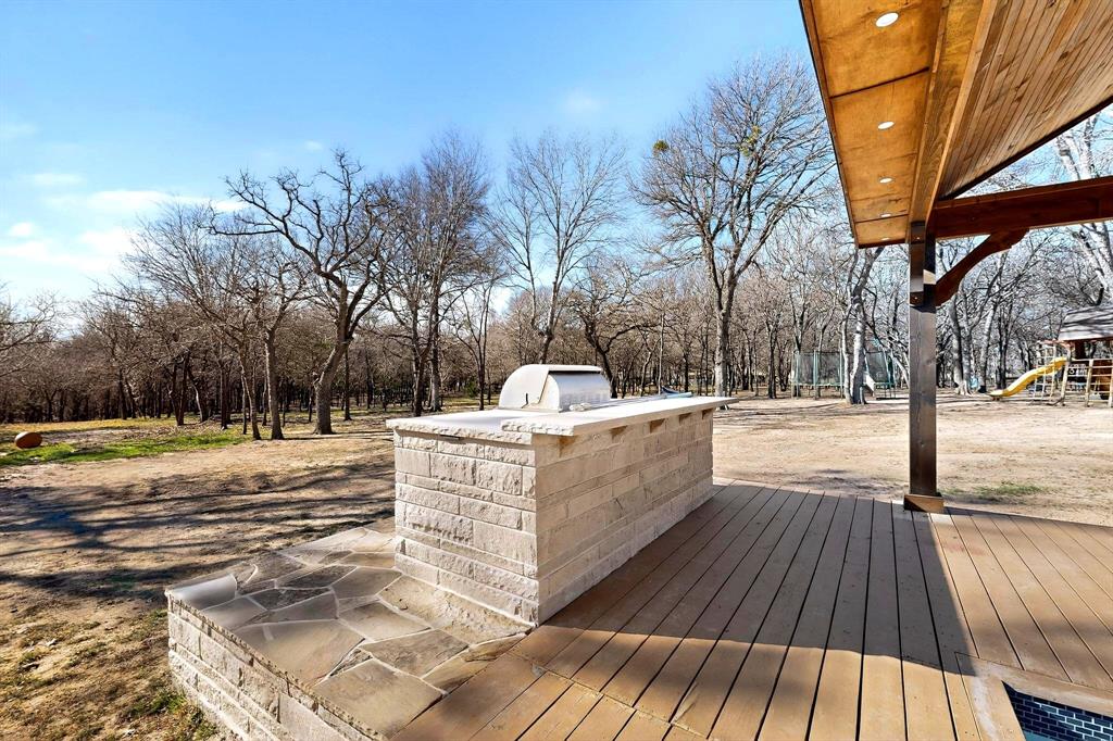 3095 Carter Road Springtown, TX 76082 - Photo 7 of 27 a view of a yard with large trees