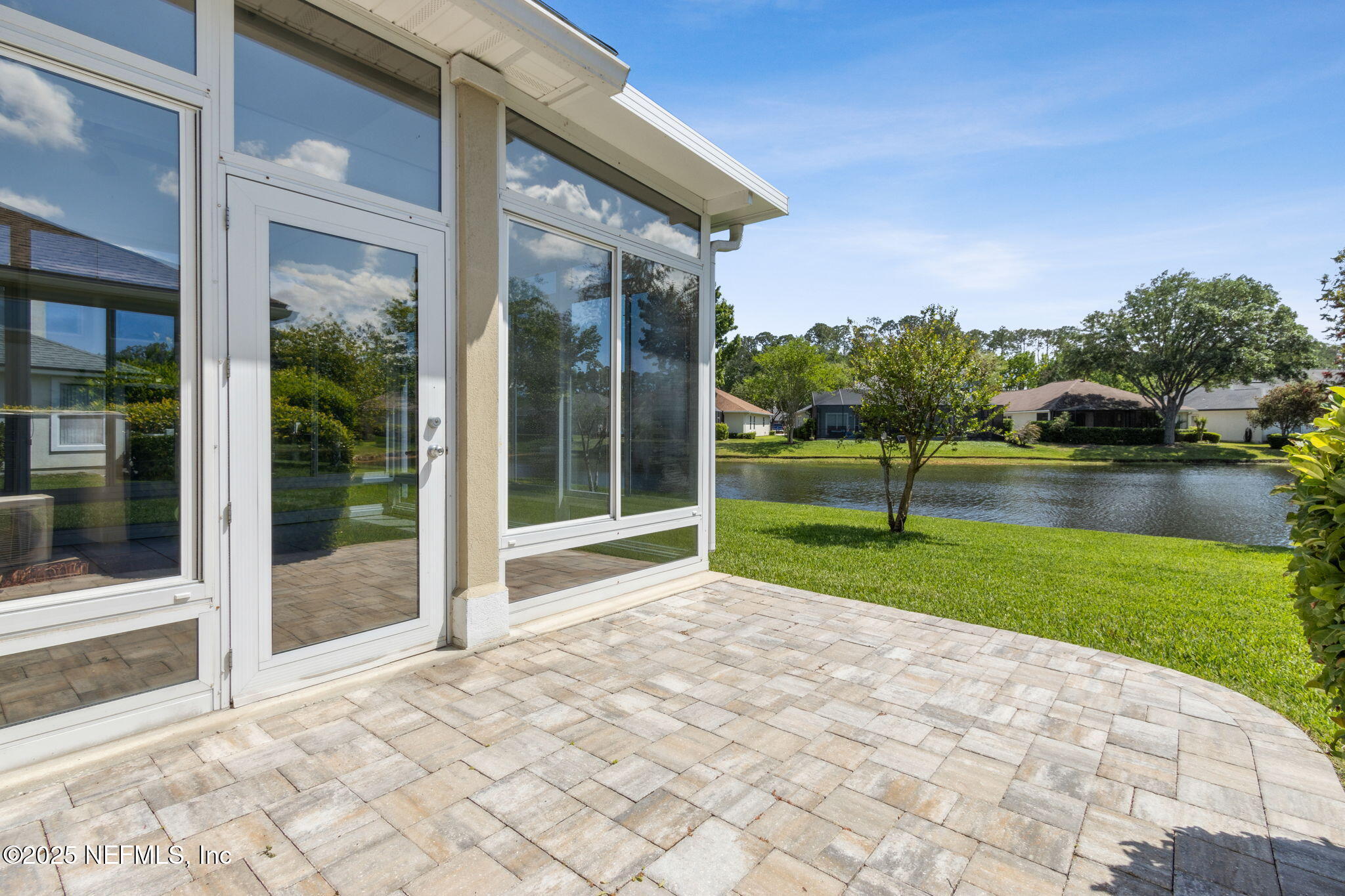 357 Edge Of Woods Road St. Augustine, FL 32092 - Photo 46 of 85 A Pavered Deck Adds Personality