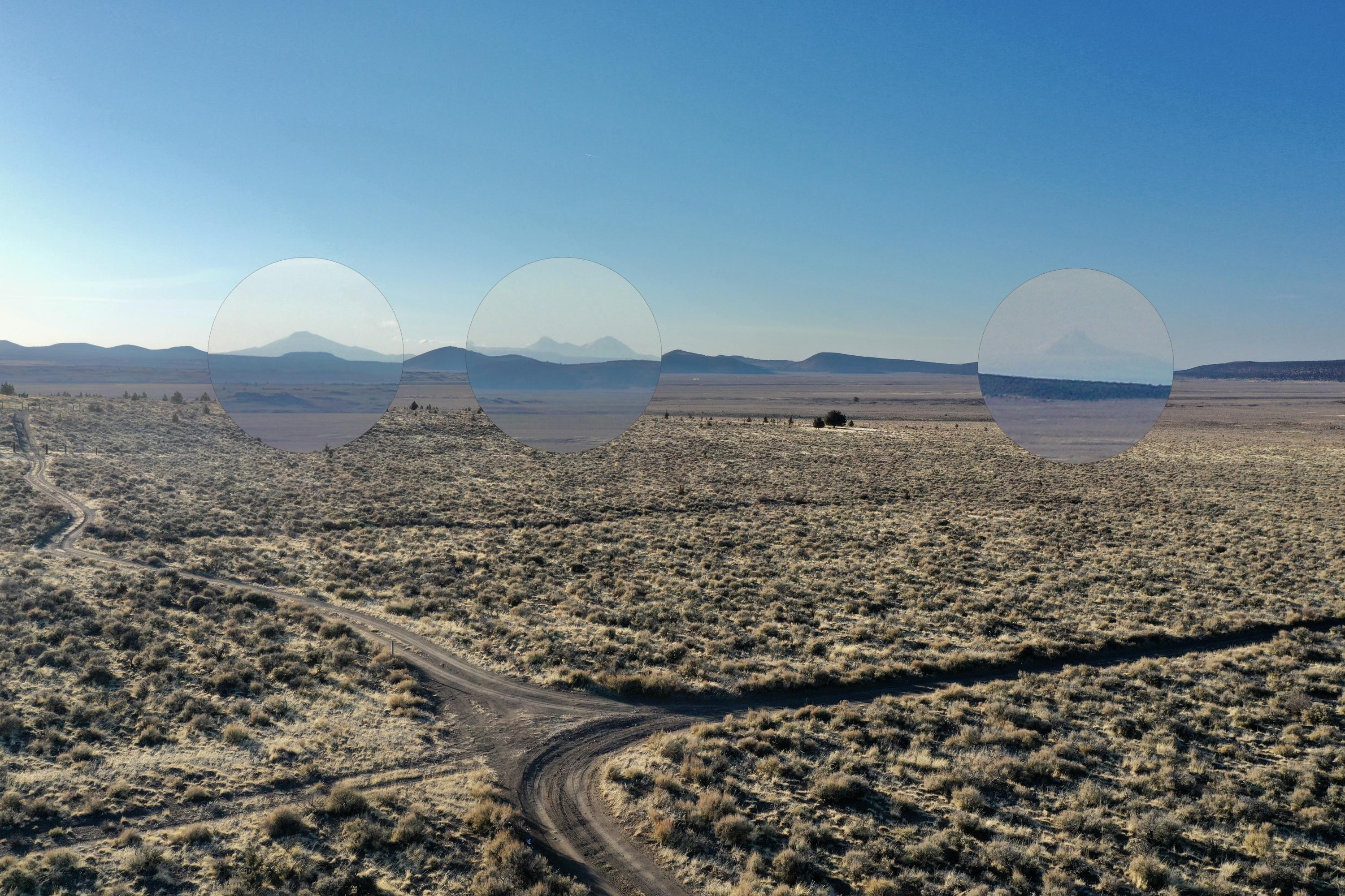 Ford Rd Bend Bend, OR 97701 - Photo 3 of 8 Telescopic zooms to show visible mountains