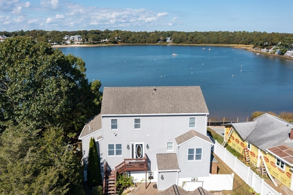 22 Cove Street Wareham, MA 02558 - Photo 1 of 35 an aerial view of a house with a lake view