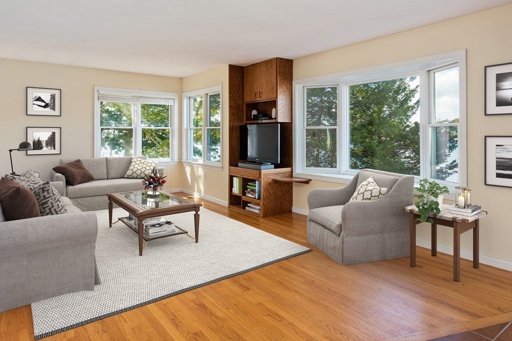 22 Cove Street Wareham, MA 02558 - Photo 14 of 35 a living room with furniture and a large window