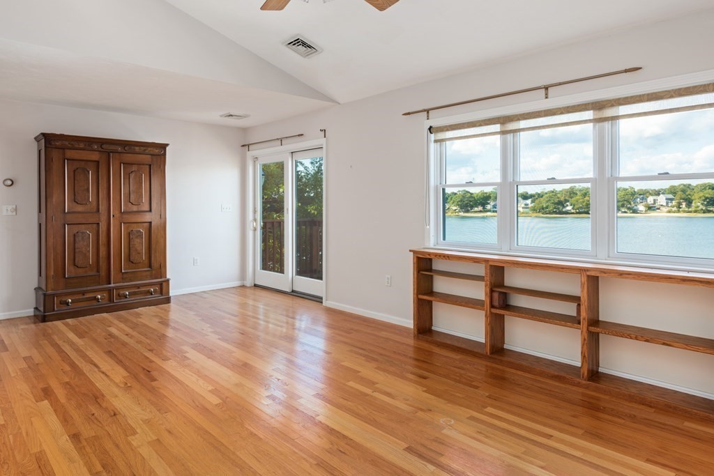 22 Cove Street Wareham, MA 02558 - Photo 21 of 35 a view of a room with wooden floor and furniture