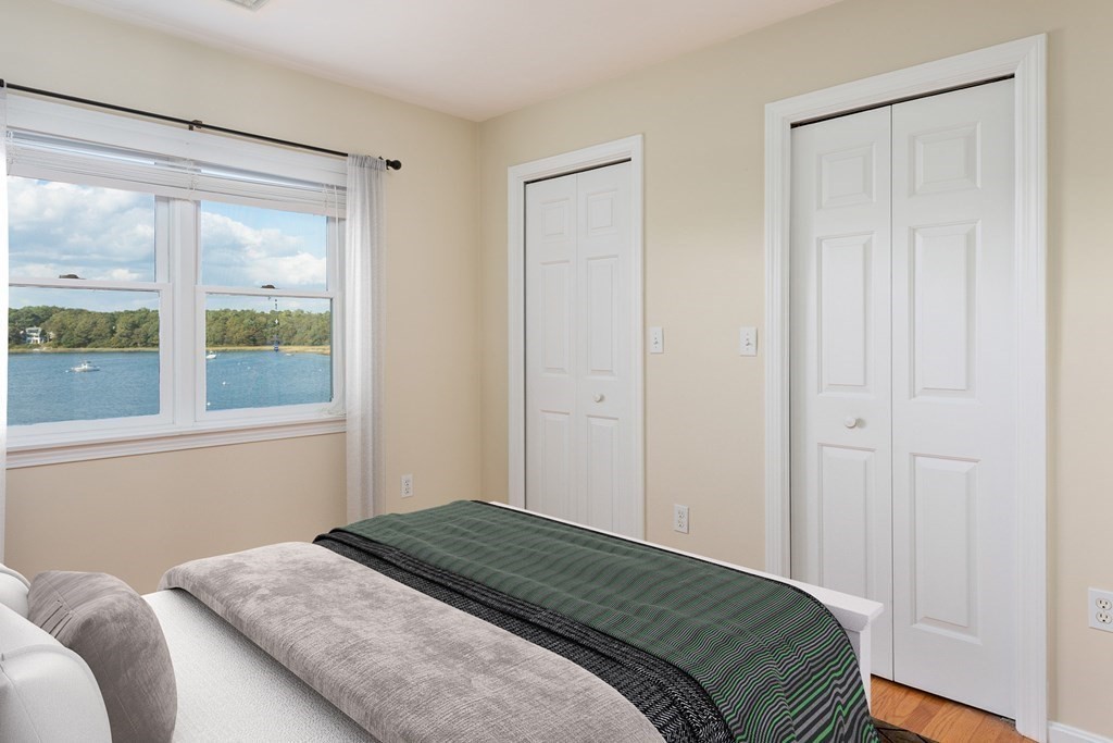 22 Cove Street Wareham, MA 02558 - Photo 23 of 35 a bedroom with a bed and a window