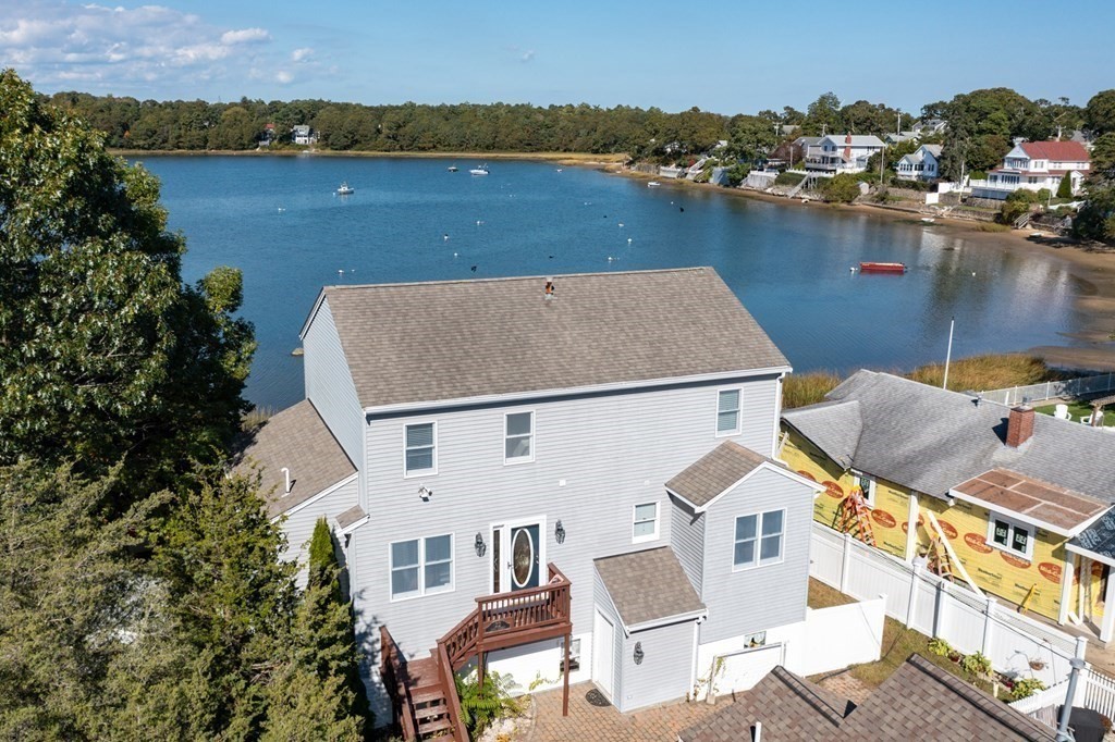 22 Cove Street Wareham, MA 02558 - Photo 24 of 35 an aerial view of a house with a lake view