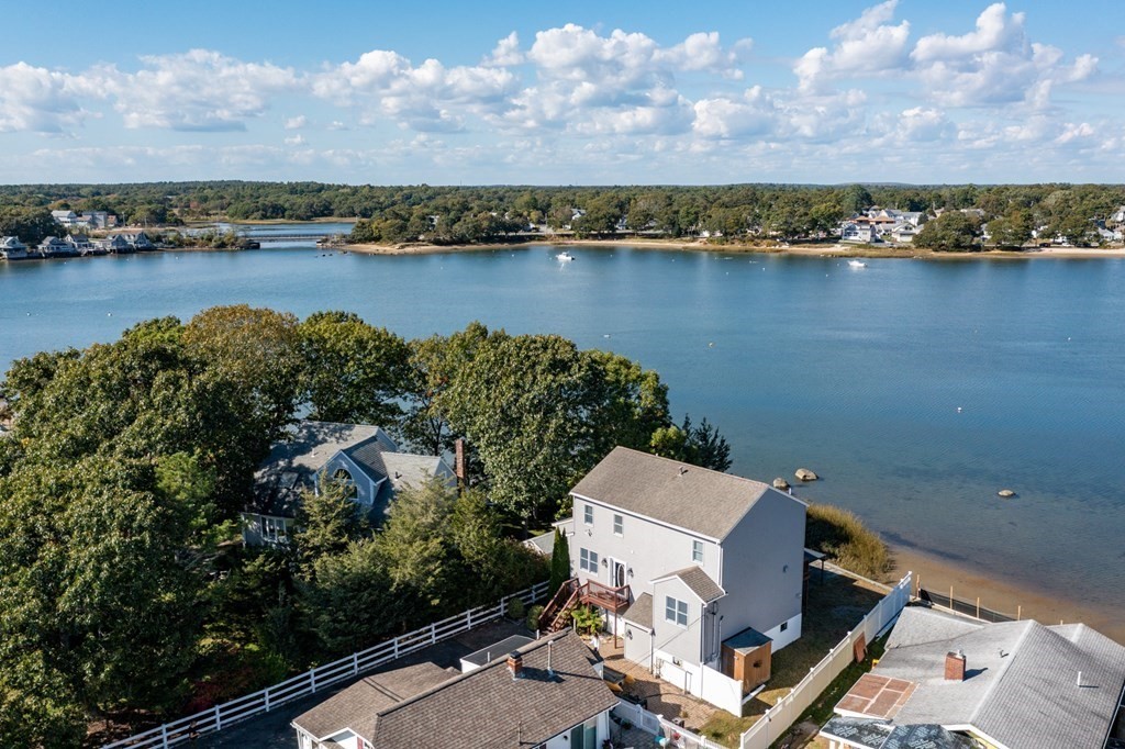 22 Cove Street Wareham, MA 02558 - Photo 26 of 35 an aerial view of a residential building with outdoor space and lake view