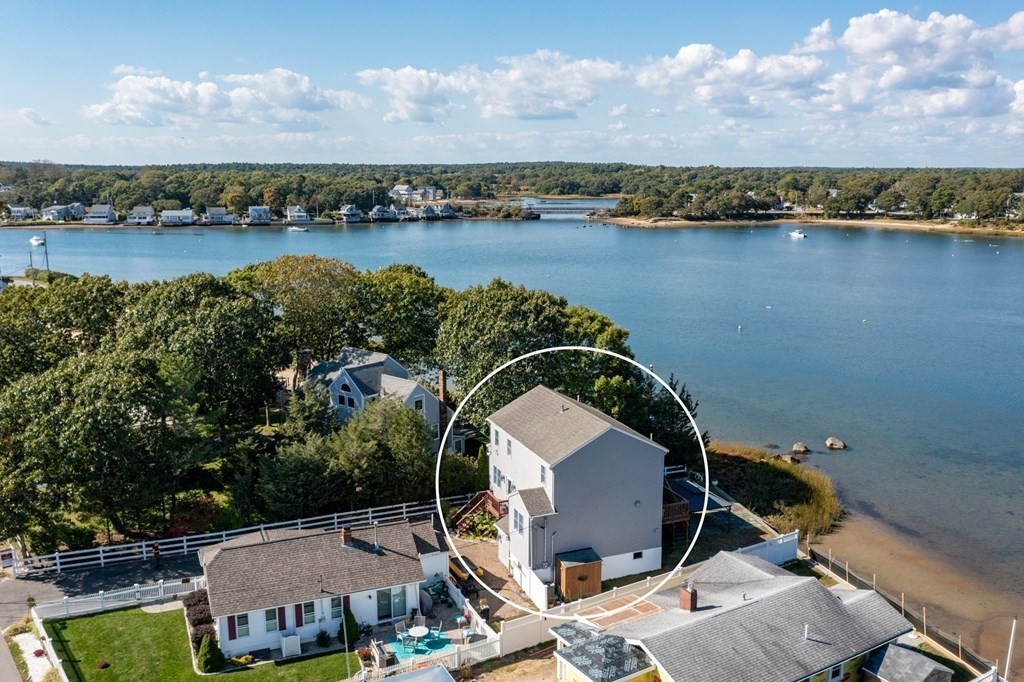 22 Cove Street Wareham, MA 02558 - Photo 27 of 35 an aerial view of a house with a lake view