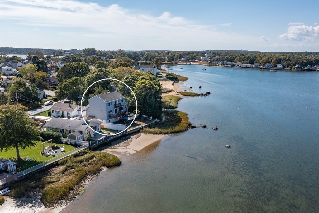 22 Cove Street Wareham, MA 02558 - Photo 28 of 35 an aerial view of a house with a yard and lake view