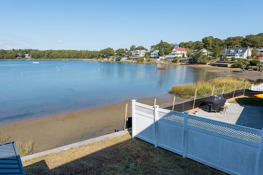 22 Cove Street Wareham, MA 02558 - Photo 9 of 35 a view of a lake with a mountain view