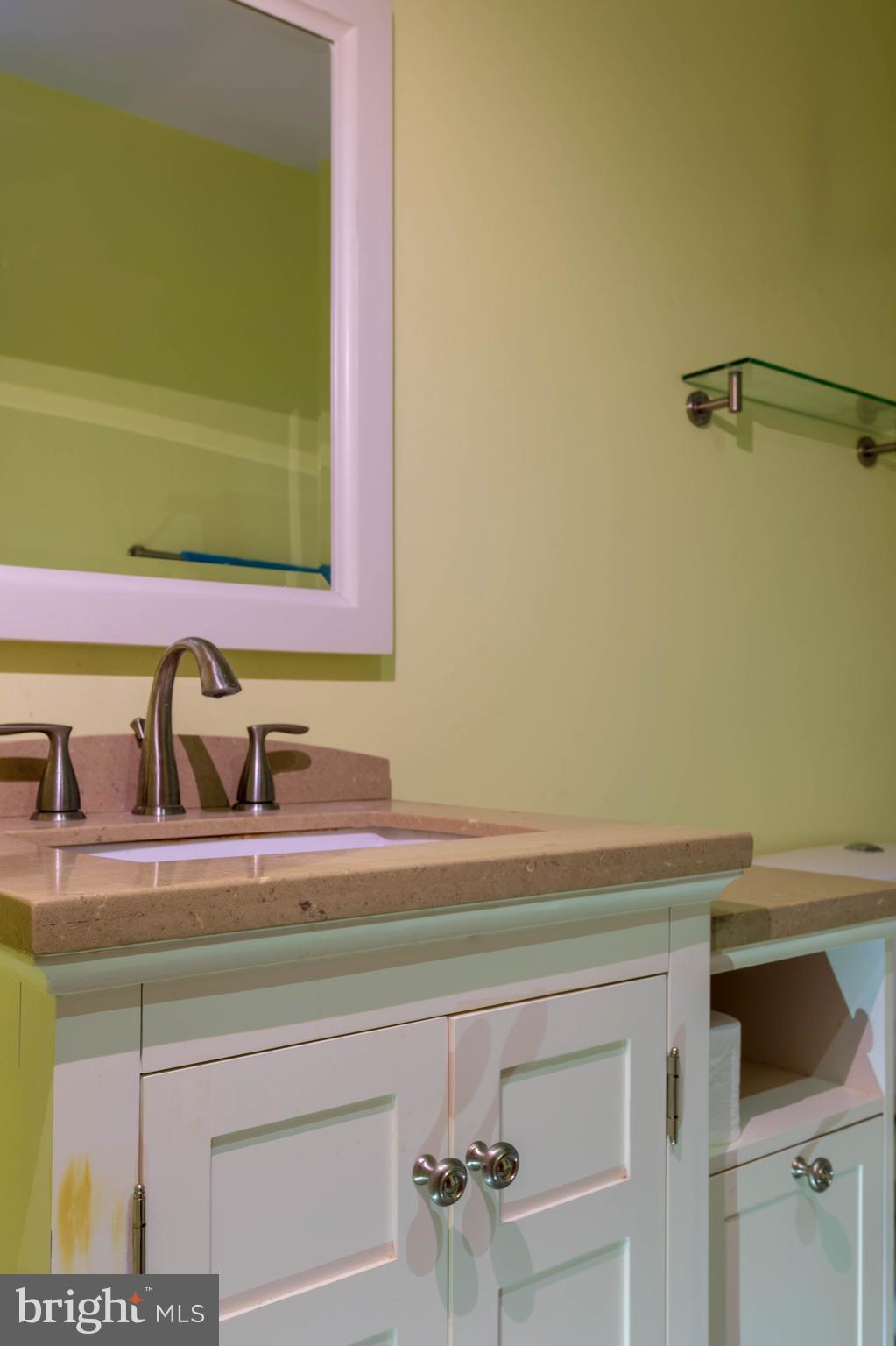 11227 Rawhide Road Lusby, MD 20657 - Photo 12 of 30 a bathroom with a sink and a mirror