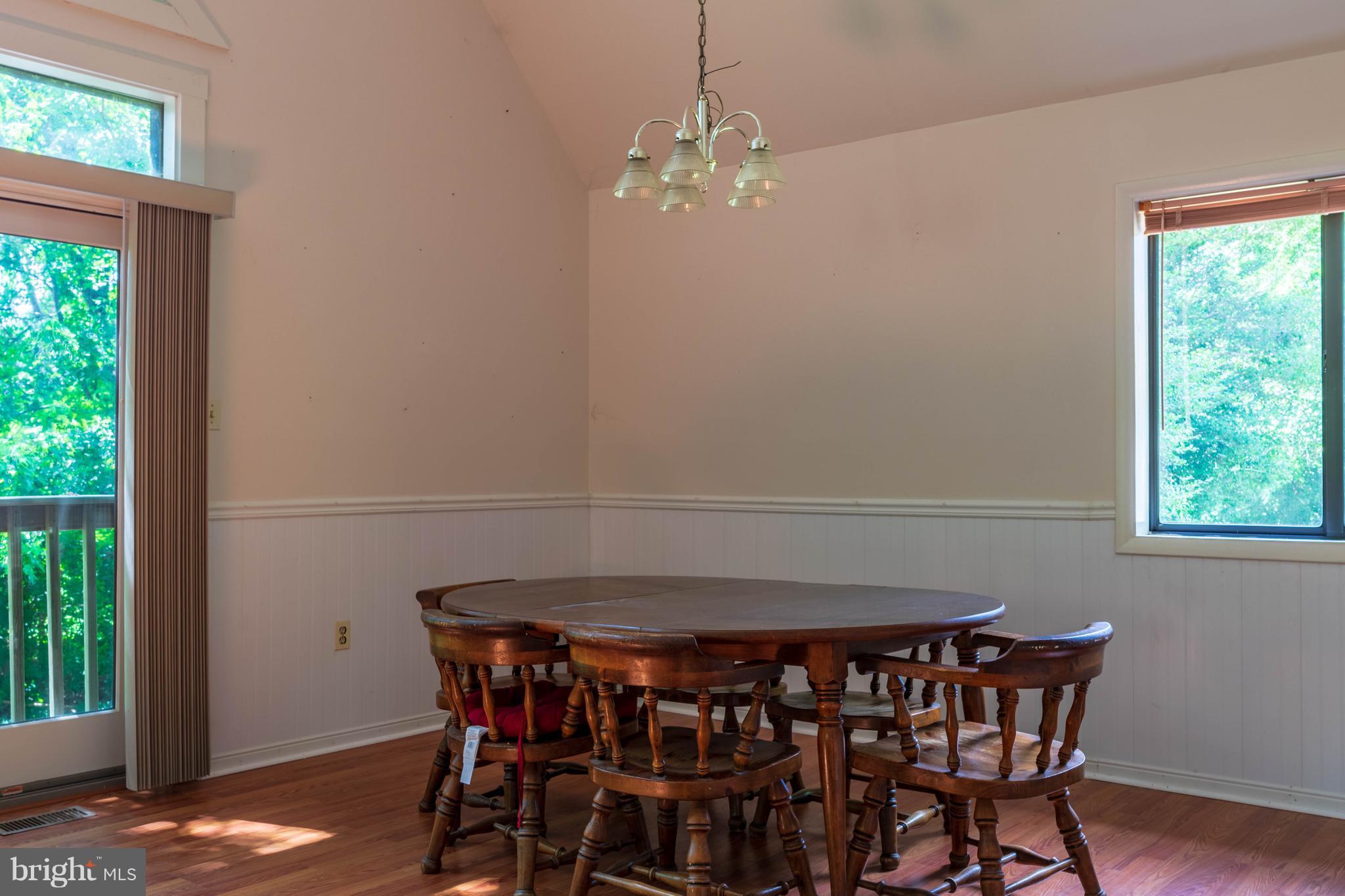 11227 Rawhide Road Lusby, MD 20657 - Photo 10 of 30 a view of a dining room with furniture and window