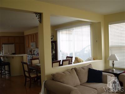 2093 Ribera Drive Oxnard, CA 93030 - Photo 2 of 9 a living room with furniture and a large window