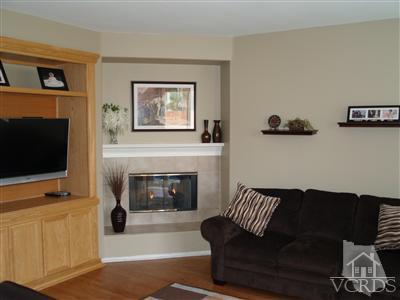 2093 Ribera Drive Oxnard, CA 93030 - Photo 3 of 9 a living room with furniture and a fireplace