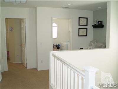 2093 Ribera Drive Oxnard, CA 93030 - Photo 8 of 9 a bathroom with a sink a mirror and a shower