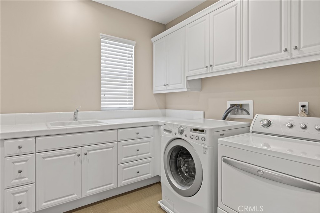 57 Harrison Irvine, CA 92618 - Photo 14 of 28 a utility room with dryer and washer