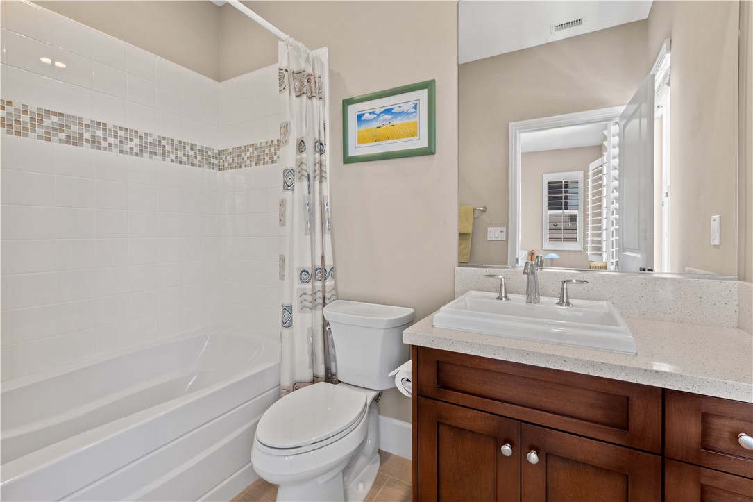 57 Harrison Irvine, CA 92618 - Photo 16 of 28 a bathroom with a sink a toilet and shower