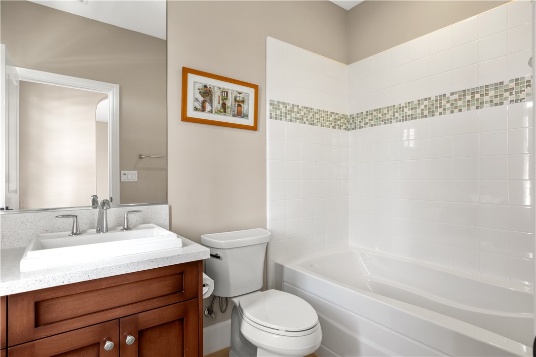 57 Harrison Irvine, CA 92618 - Photo 18 of 28 a bathroom with a sink a toilet and shower