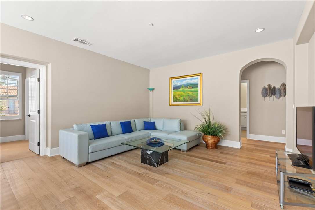 57 Harrison Irvine, CA 92618 - Photo 20 of 28 a living room with furniture and wooden floor