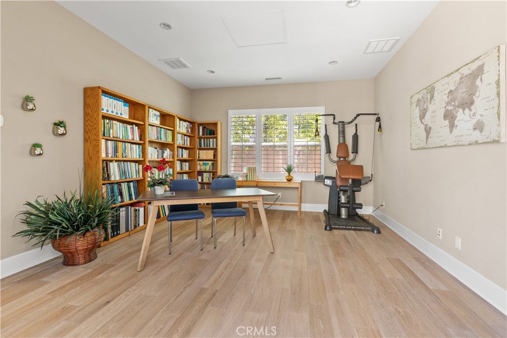 57 Harrison Irvine, CA 92618 - Photo 26 of 28 a work room with furniture and a potted plant