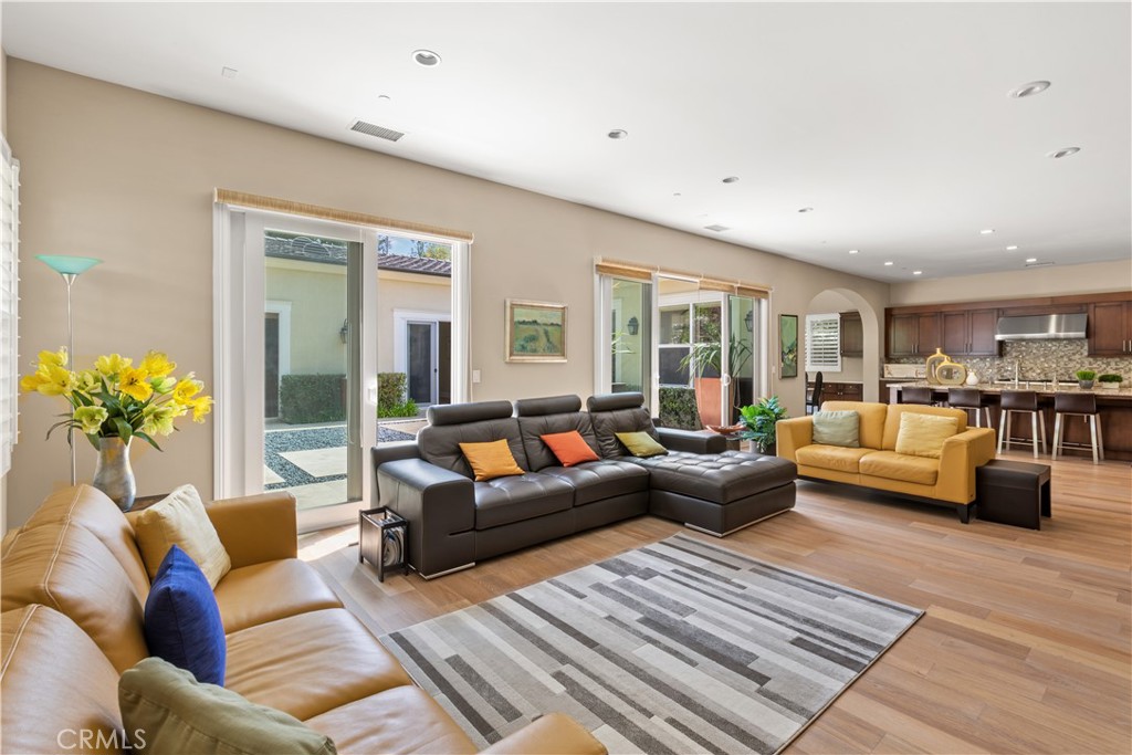 57 Harrison Irvine, CA 92618 - Photo 7 of 28 a living room with furniture and a table