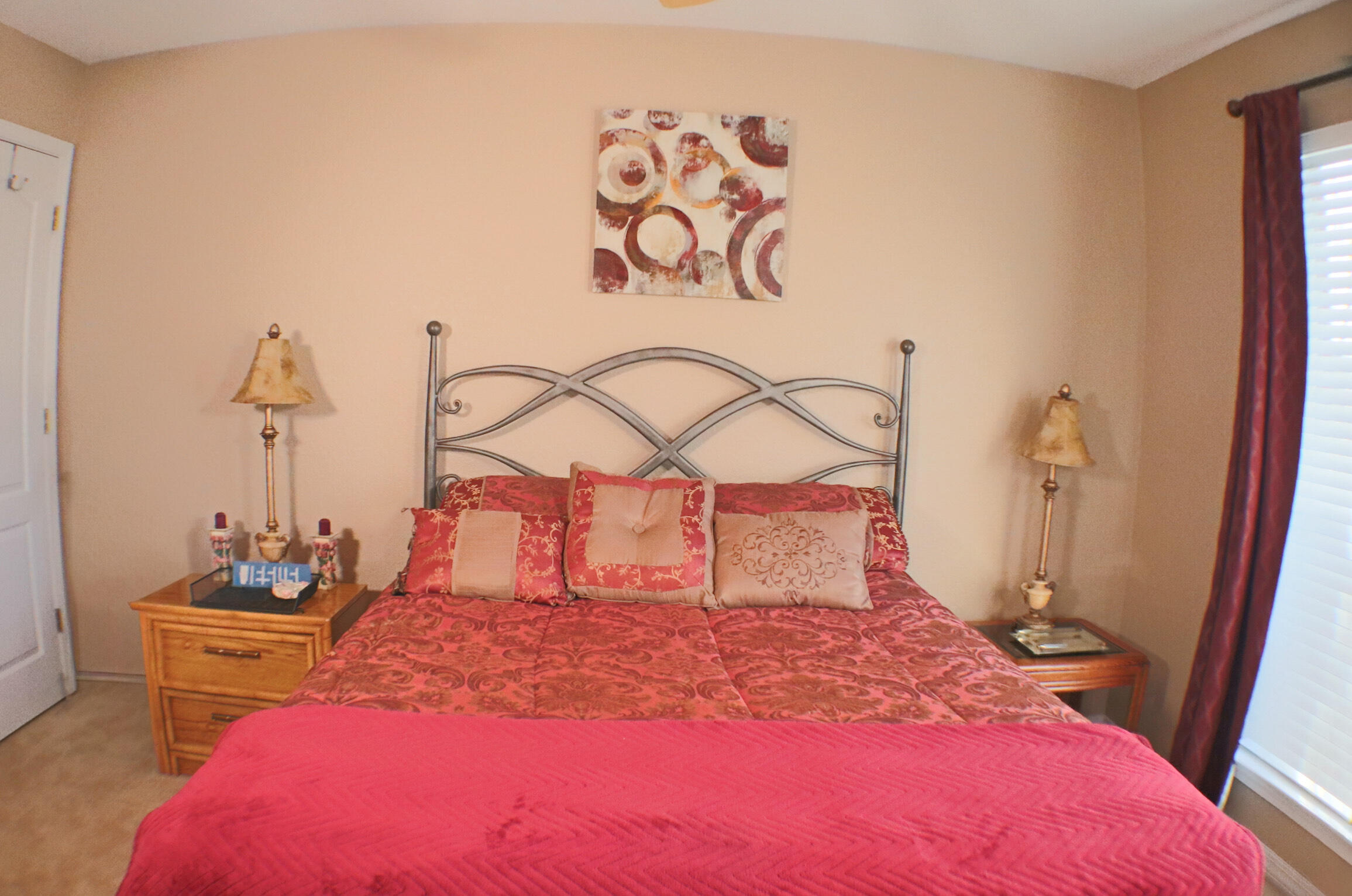 564 East Shipwreck Road Santa Rosa Beach, FL 32459 - Photo 23 of 38 a bedroom with a bed and a table in it