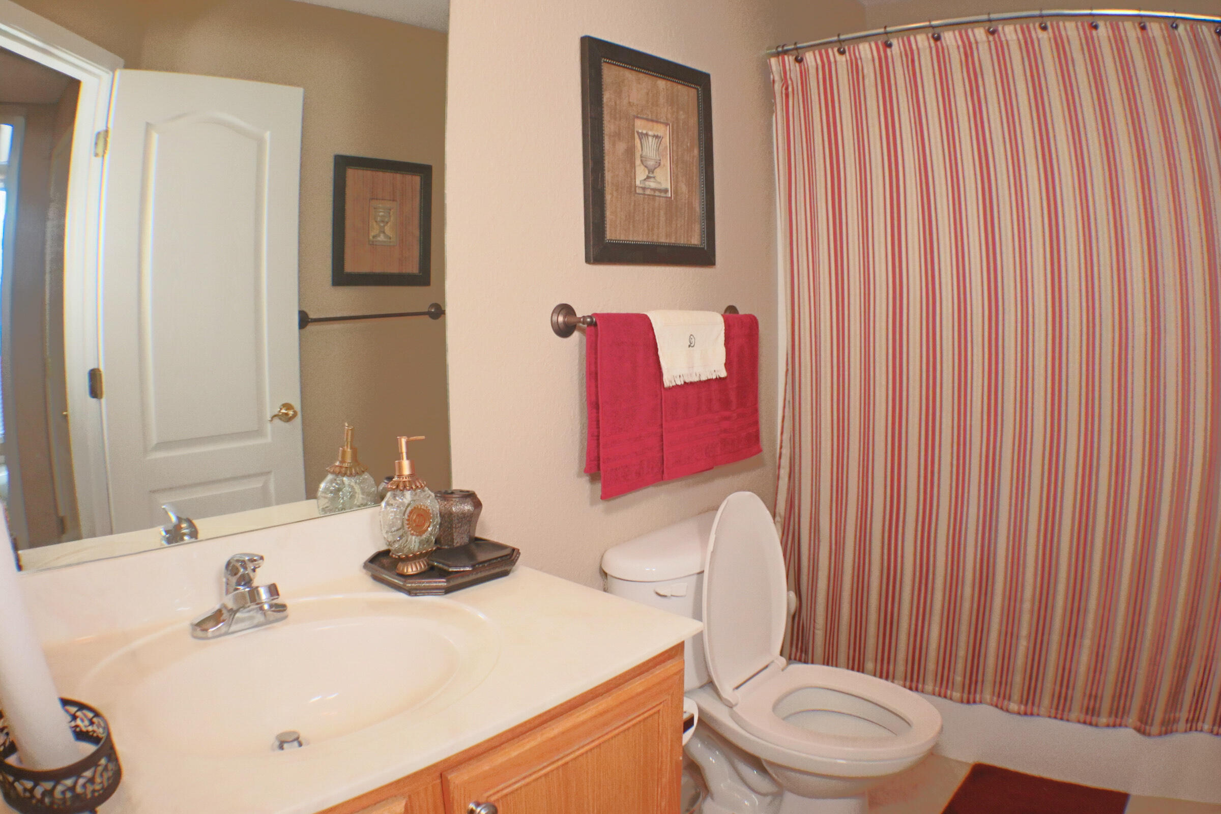 564 East Shipwreck Road Santa Rosa Beach, FL 32459 - Photo 27 of 38 a bathroom with a sink toilet and shower