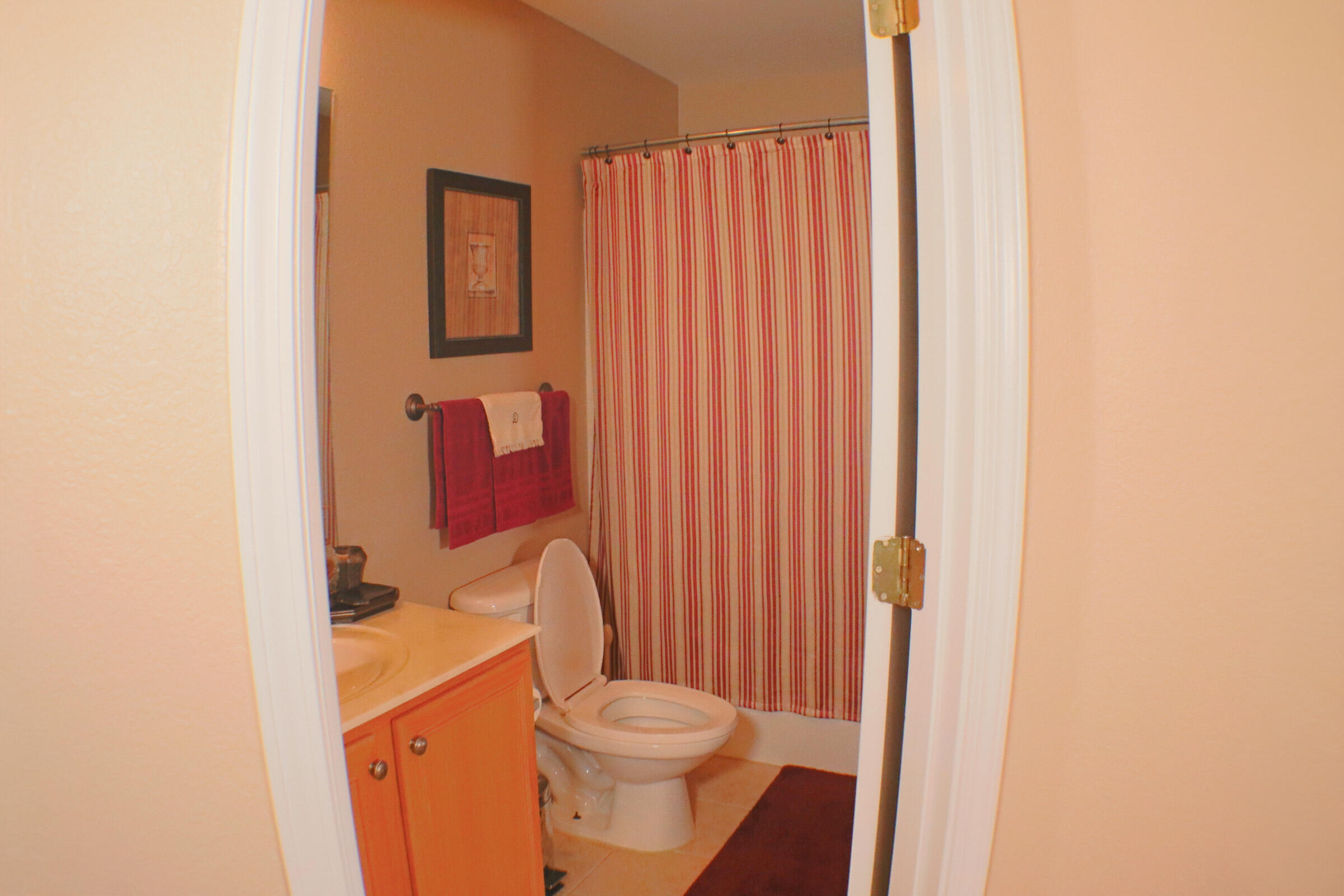 564 East Shipwreck Road Santa Rosa Beach, FL 32459 - Photo 28 of 38 a bathroom with a toilet a sink and bathtub