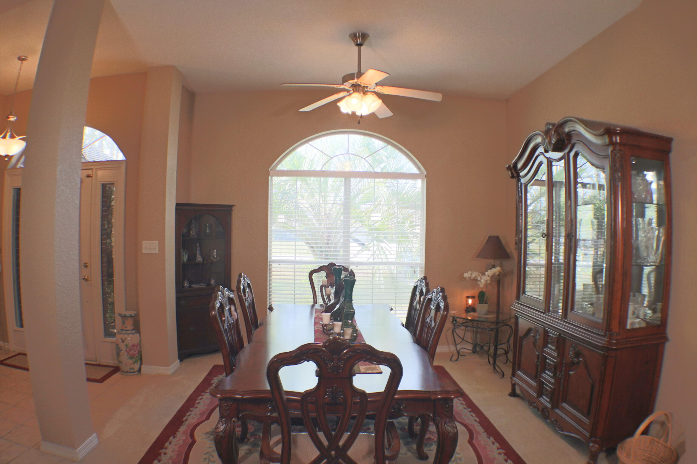 564 East Shipwreck Road Santa Rosa Beach, FL 32459 - Photo 3 of 38 a view of a dining room with furniture and a chandelier