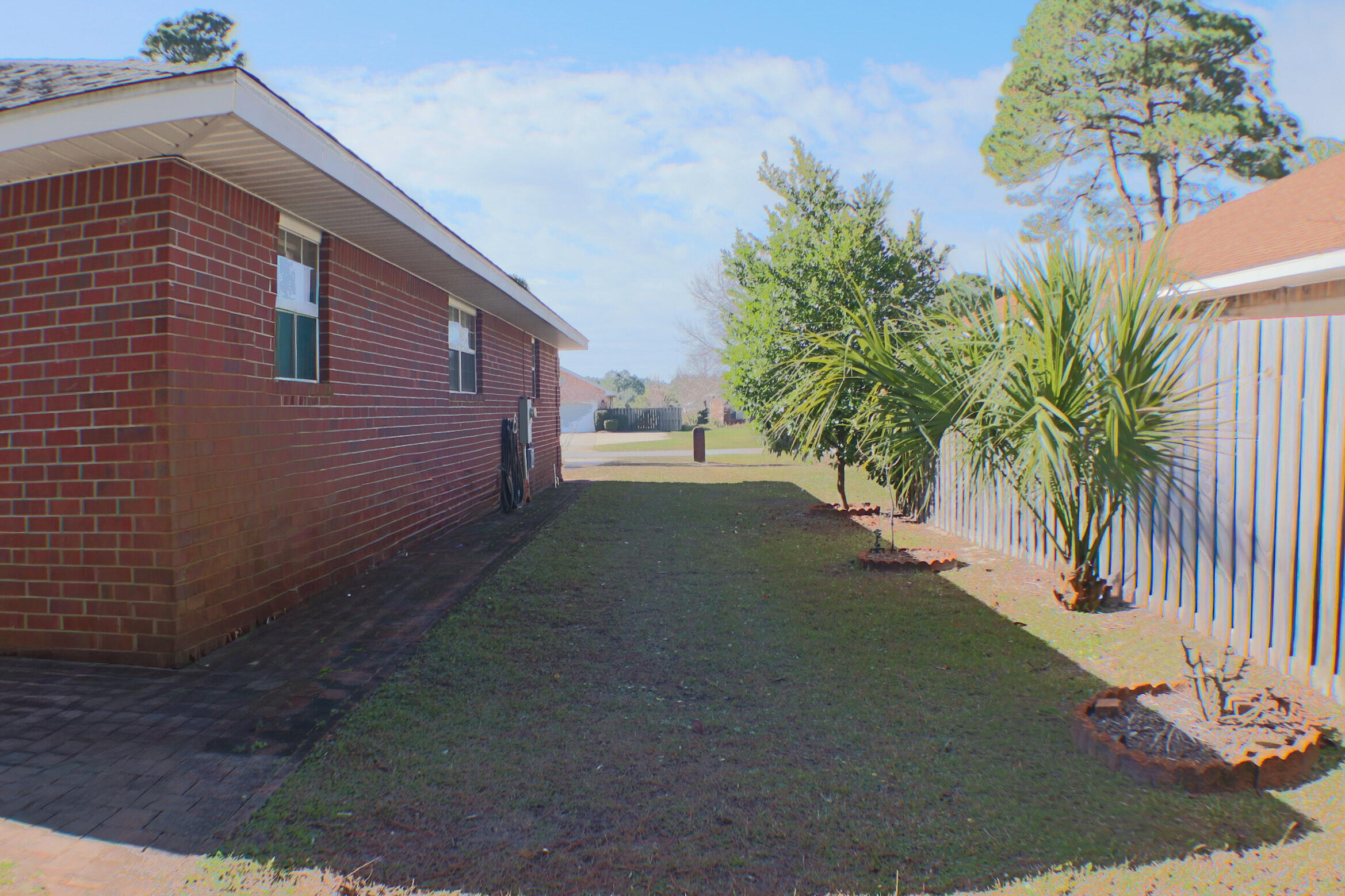 564 East Shipwreck Road Santa Rosa Beach, FL 32459 - Photo 32 of 38 a view of a house with a yard