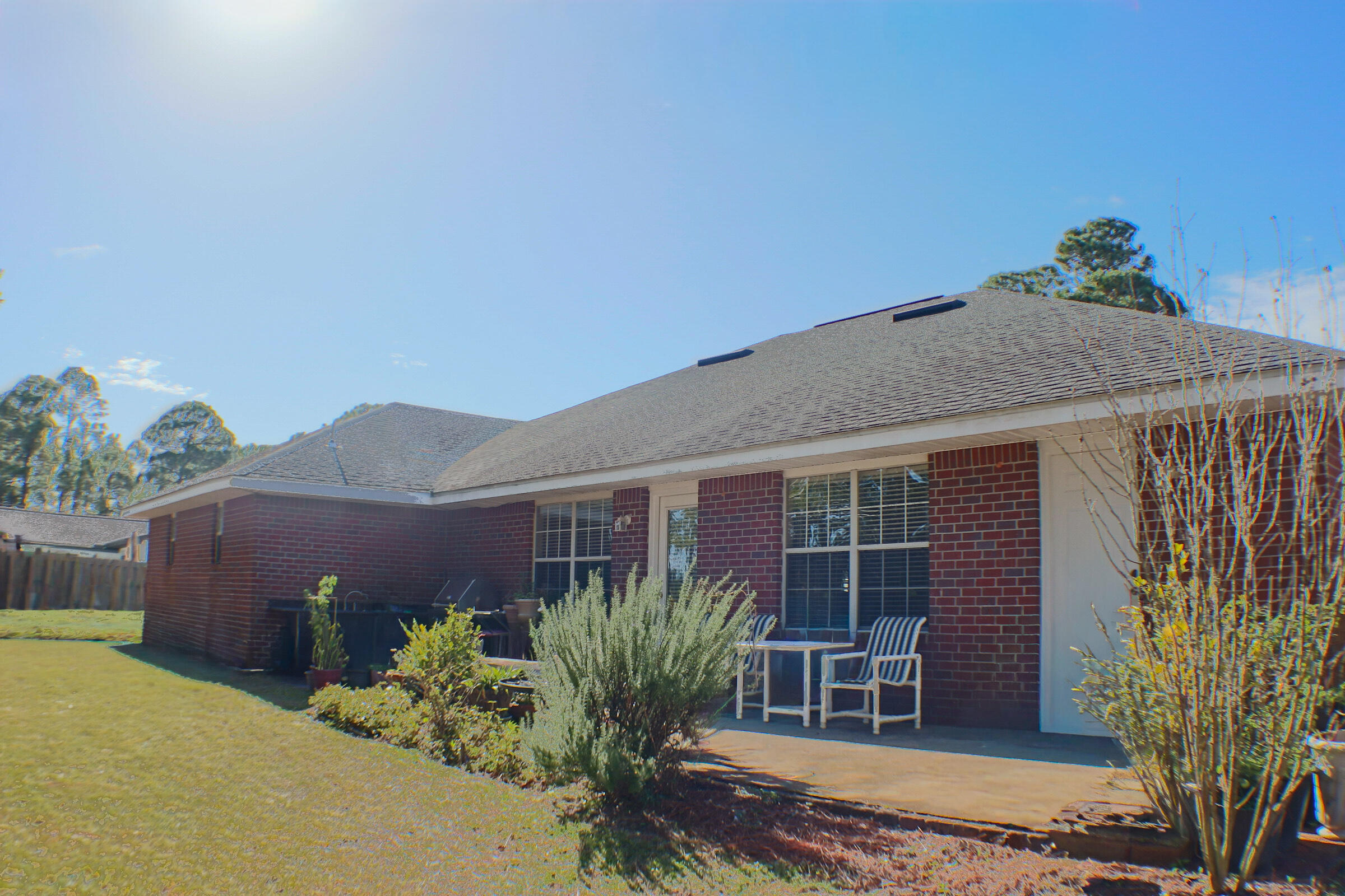 564 East Shipwreck Road Santa Rosa Beach, FL 32459 - Photo 34 of 38 a front view of a house with a yard