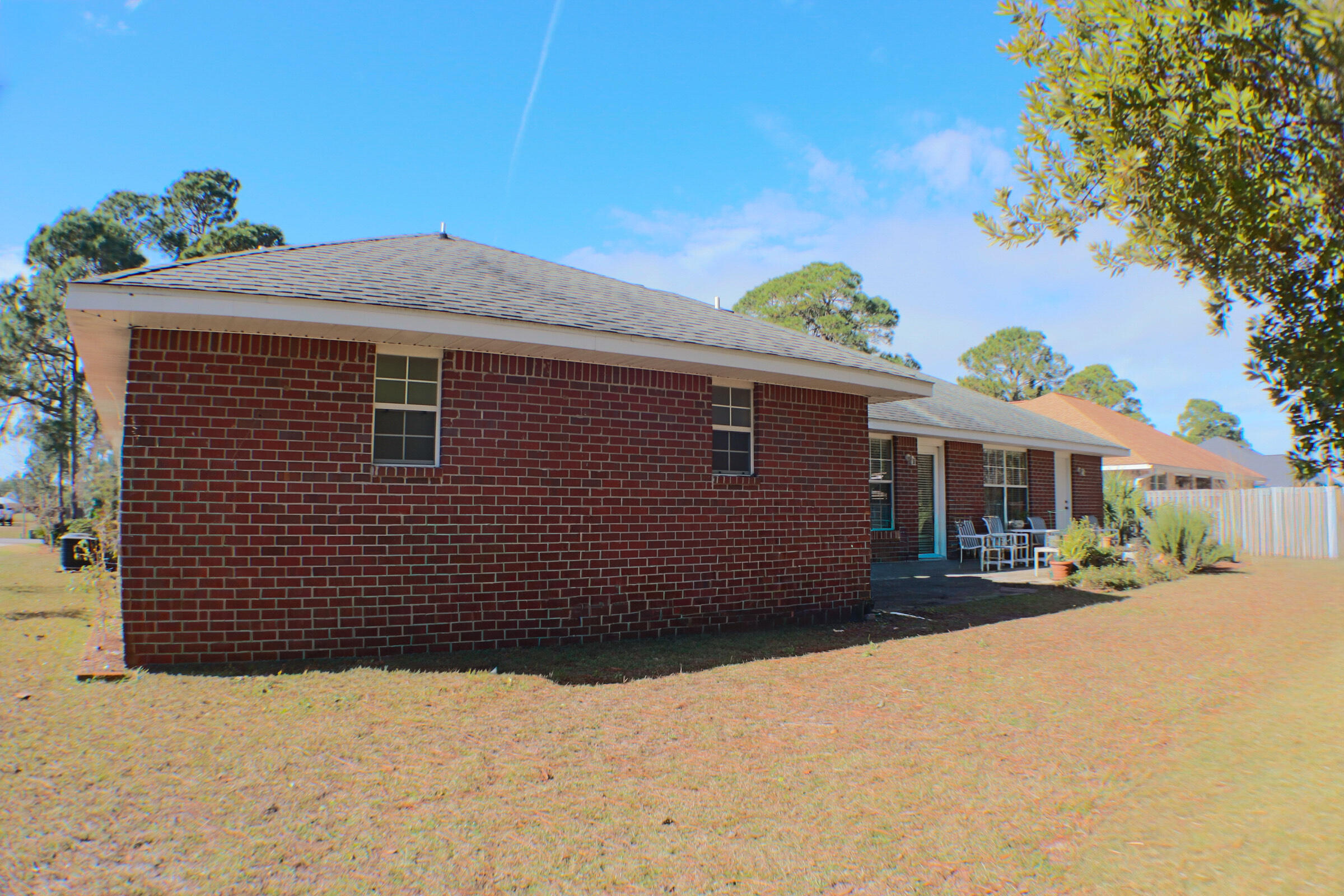 564 East Shipwreck Road Santa Rosa Beach, FL 32459 - Photo 36 of 38 a front view of a house with a yard
