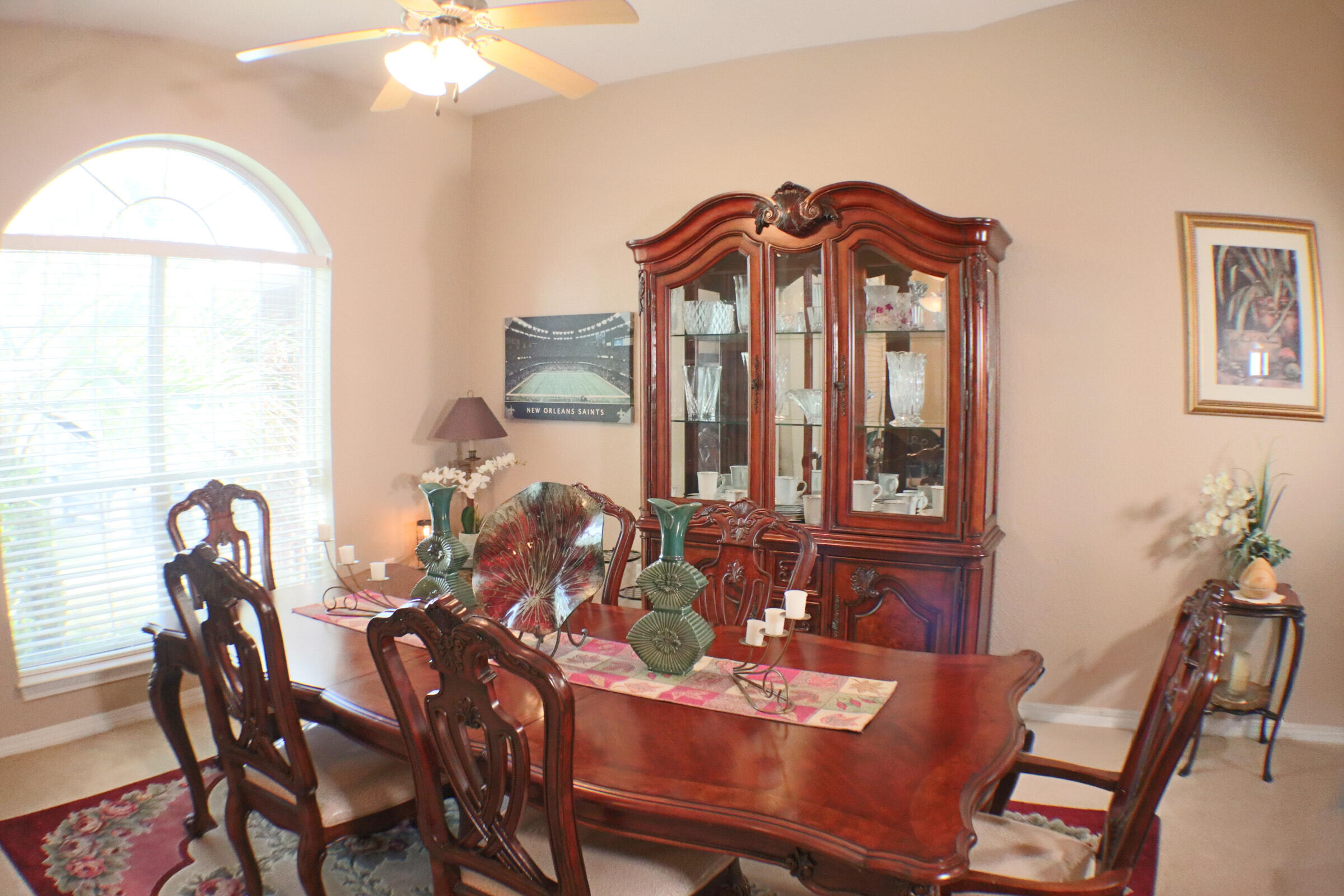 564 East Shipwreck Road Santa Rosa Beach, FL 32459 - Photo 4 of 38 a view of a dining room with furniture and chandelier