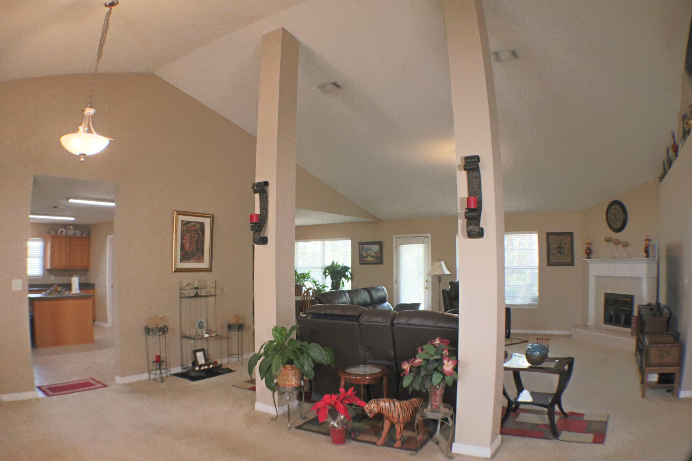 564 East Shipwreck Road Santa Rosa Beach, FL 32459 - Photo 5 of 38 a room with gym equipment and a fireplace