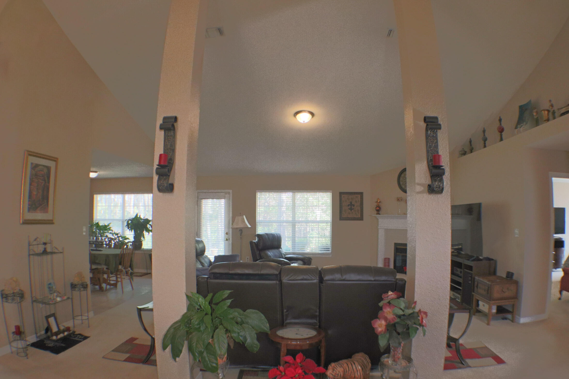 564 East Shipwreck Road Santa Rosa Beach, FL 32459 - Photo 7 of 38 a room with lots of furniture and clutter