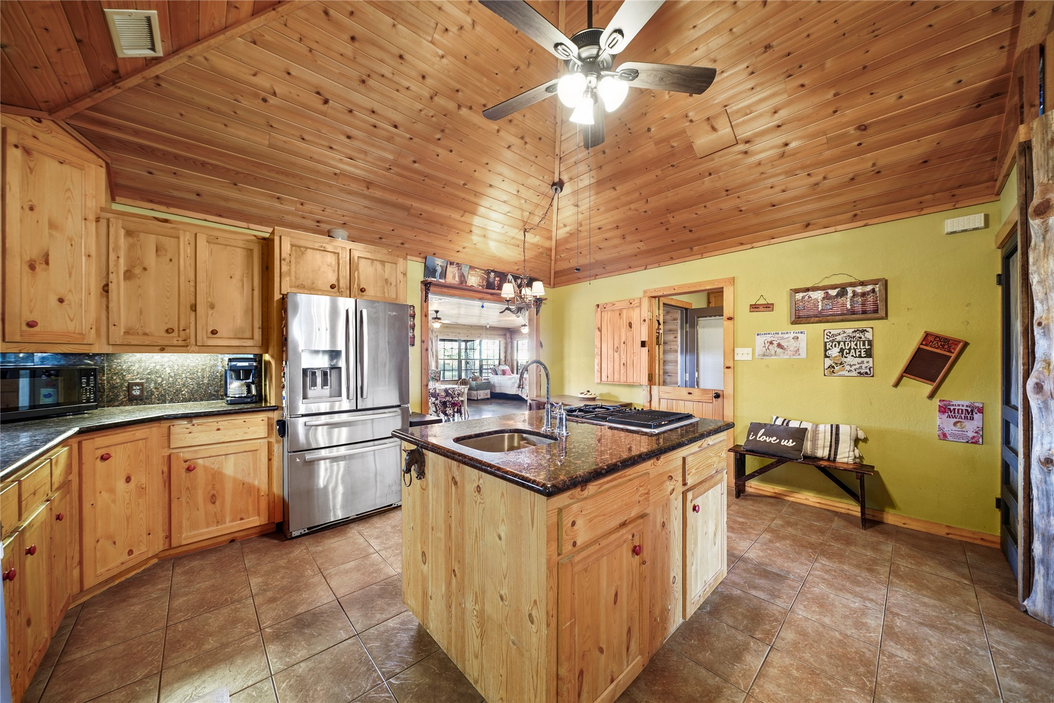 6710 Boothline Road Richmond, TX 77469 - Photo 16 of 43 a kitchen with stainless steel appliances granite countertop a sink stove and refrigerator