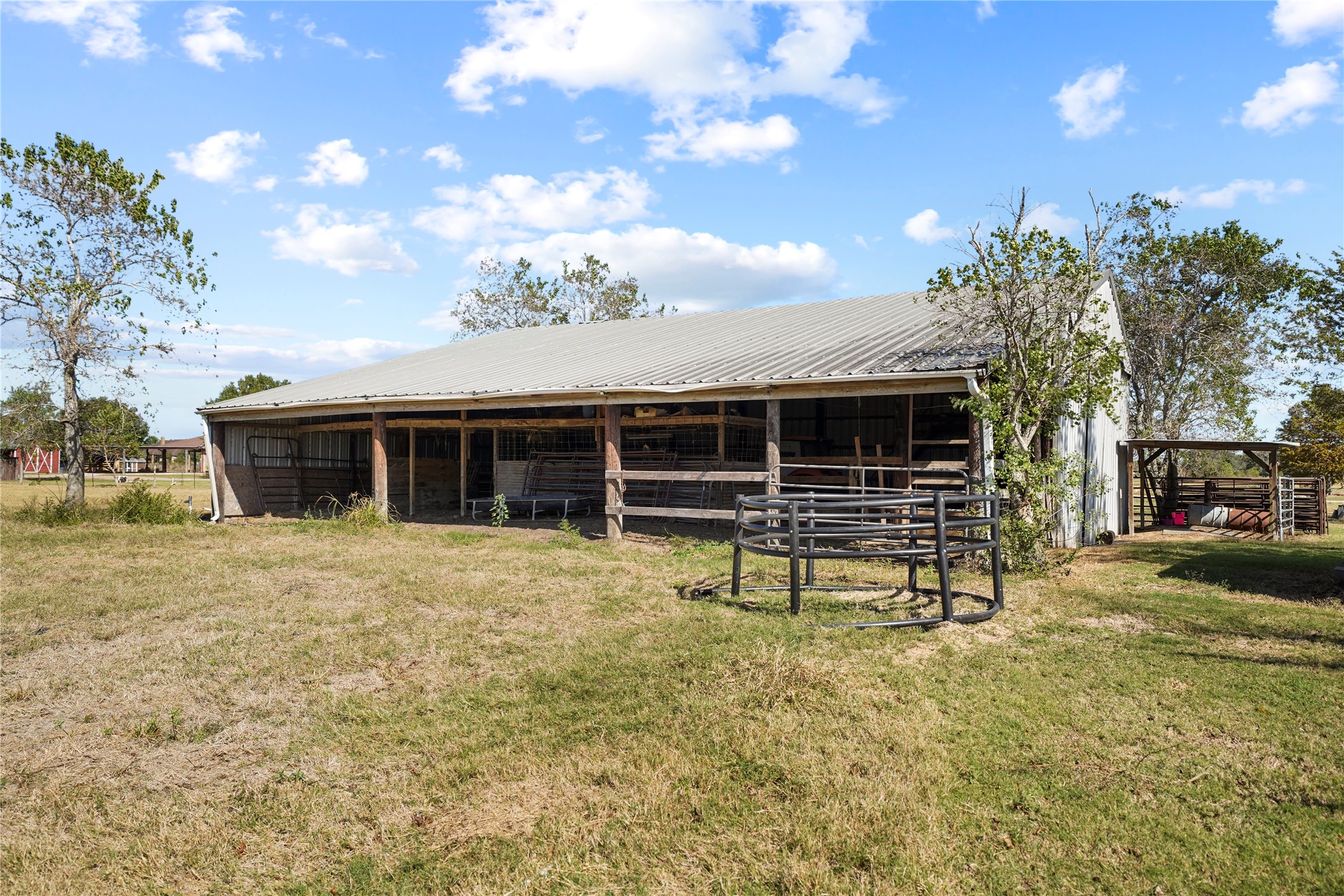 6710 Boothline Road Richmond, TX 77469 - Photo 39 of 43 a view of a house with a yard and porch