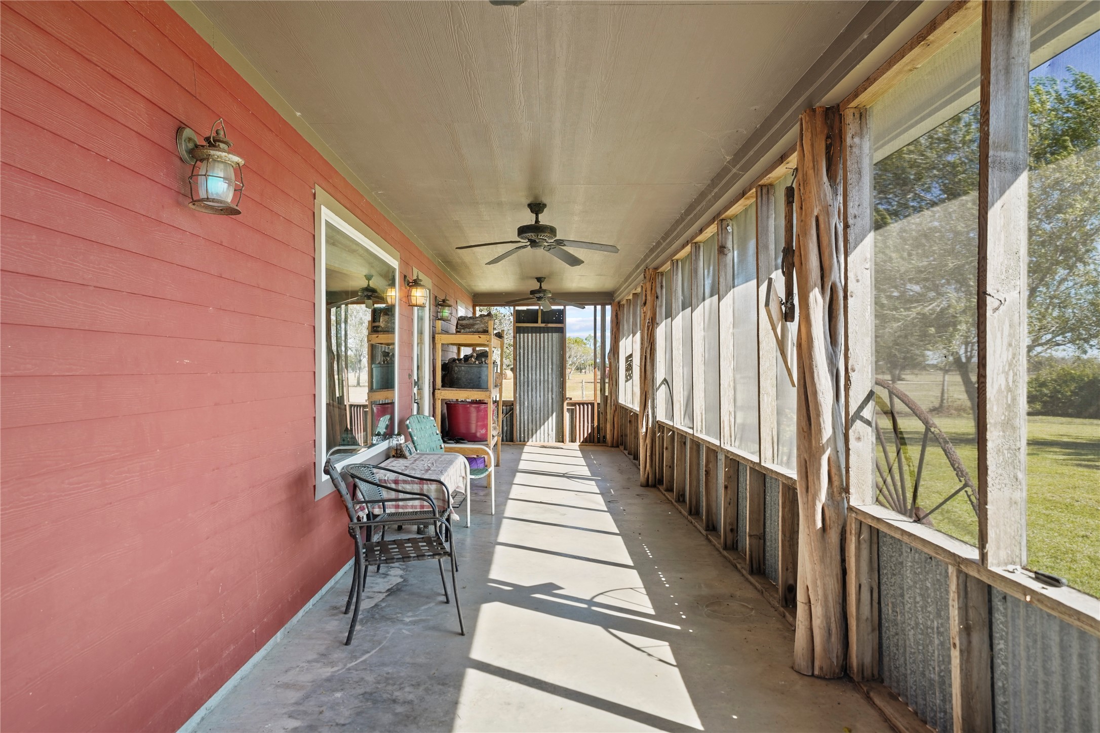 6710 Boothline Road Richmond, TX 77469 - Photo 42 of 43 a view of a patio with table and chairs and wooden floor