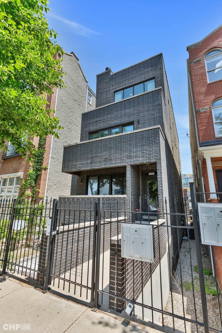 1331 North Mohawk Street, Unit 3 Chicago, IL 60610 - Photo 1 of 28 front view of a house with a porch