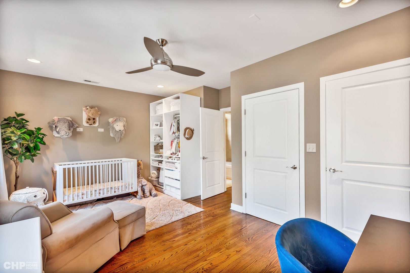 1331 North Mohawk Street, Unit 3 Chicago, IL 60610 - Photo 16 of 28 a bedroom with furniture and wooden floor