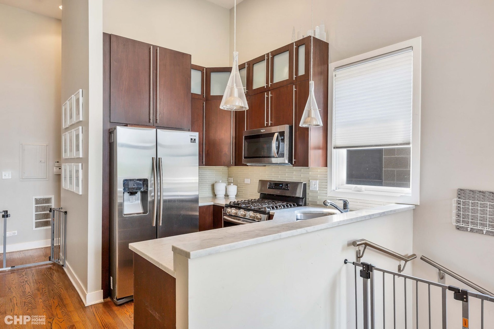 1331 North Mohawk Street, Unit 3 Chicago, IL 60610 - Photo 6 of 28 a kitchen that has a cabinets and a stove