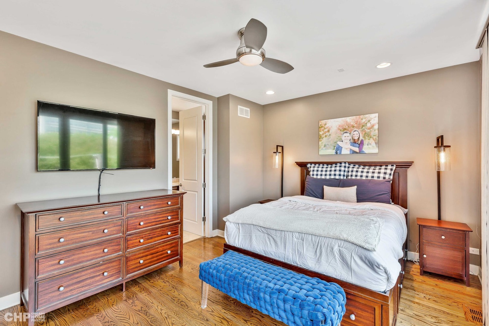 1331 North Mohawk Street, Unit 3 Chicago, IL 60610 - Photo 9 of 28 a bedroom with a bed and a flat screen tv