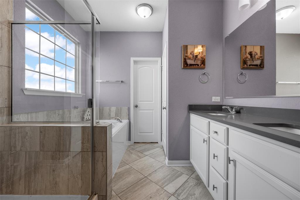 11308 Gulch Drive Lorena, TX 76655 - Photo 16 of 40 a bathroom with double sink and two mirror