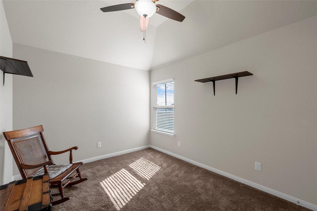 11308 Gulch Drive Lorena, TX 76655 - Photo 25 of 40 a view of a room with lounge chair and windows