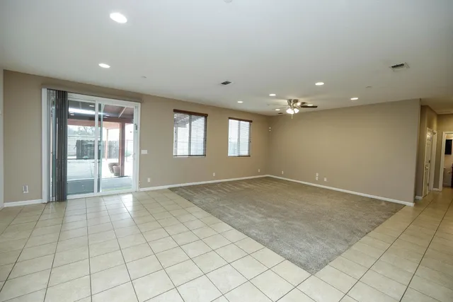 a view of a hallway with a wooden floor
