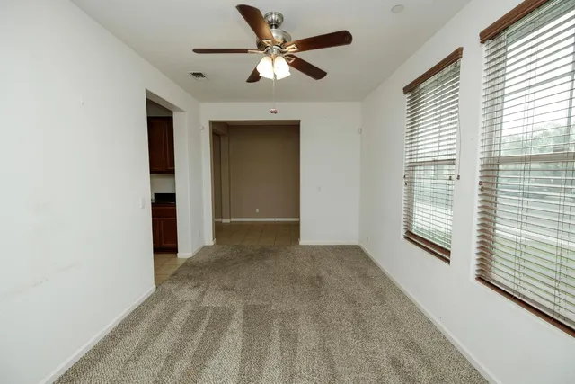 a bathroom with a shower and a bath tub