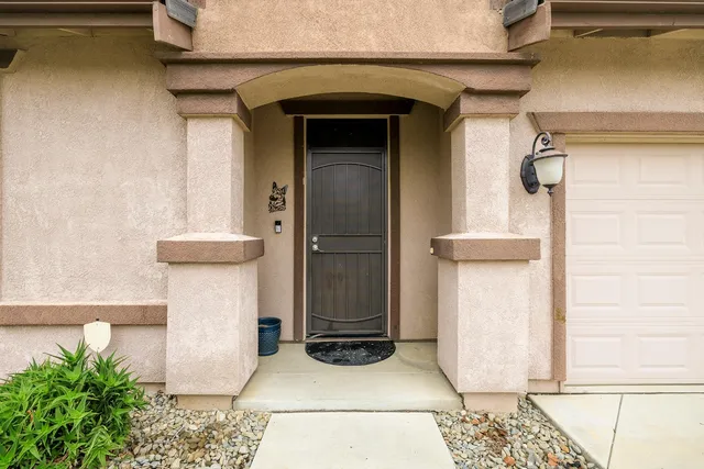 a kitchen with stainless steel appliances granite countertop a sink stove microwave and cabinets